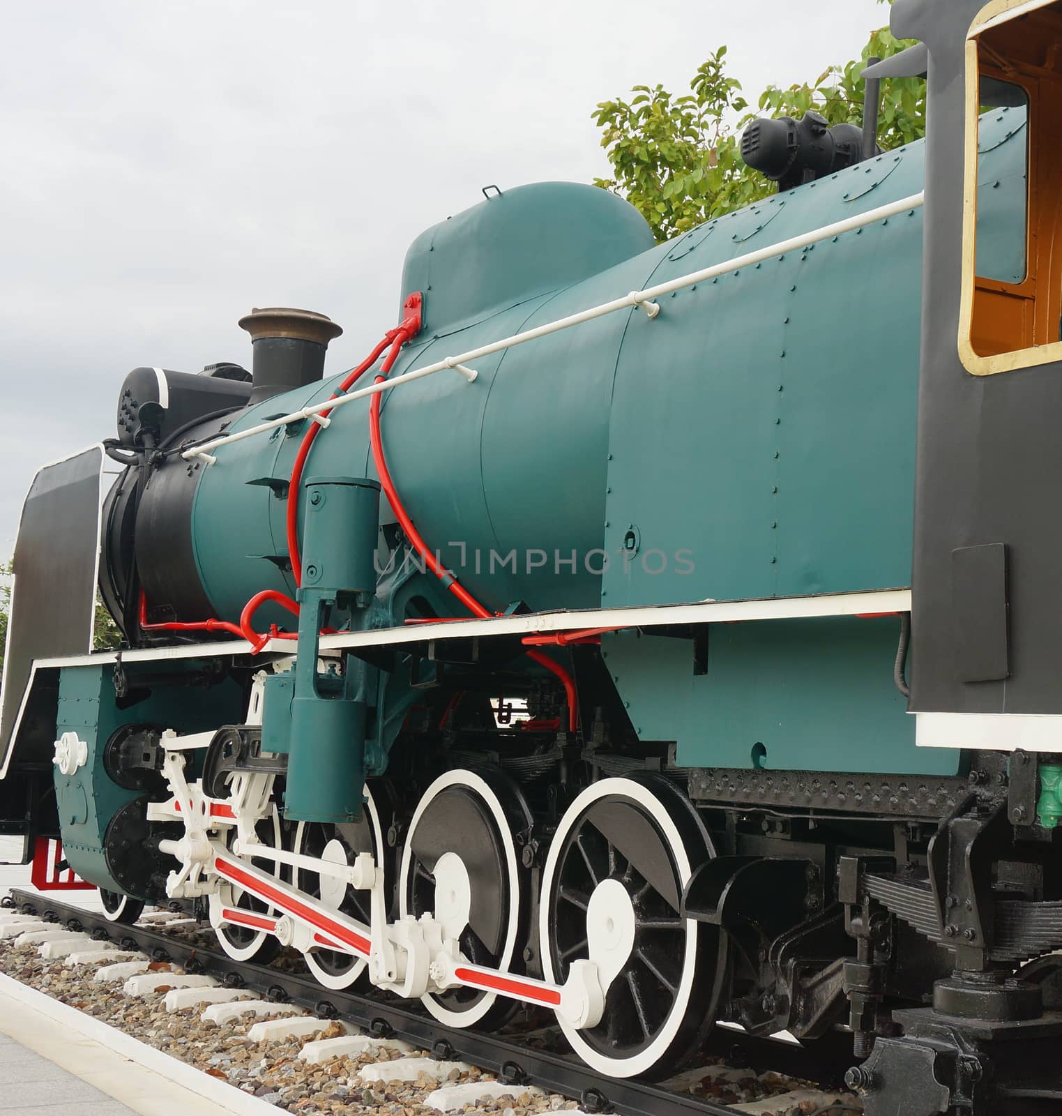 Ancient steam train placed on the tracks, displayed to the audience.                               