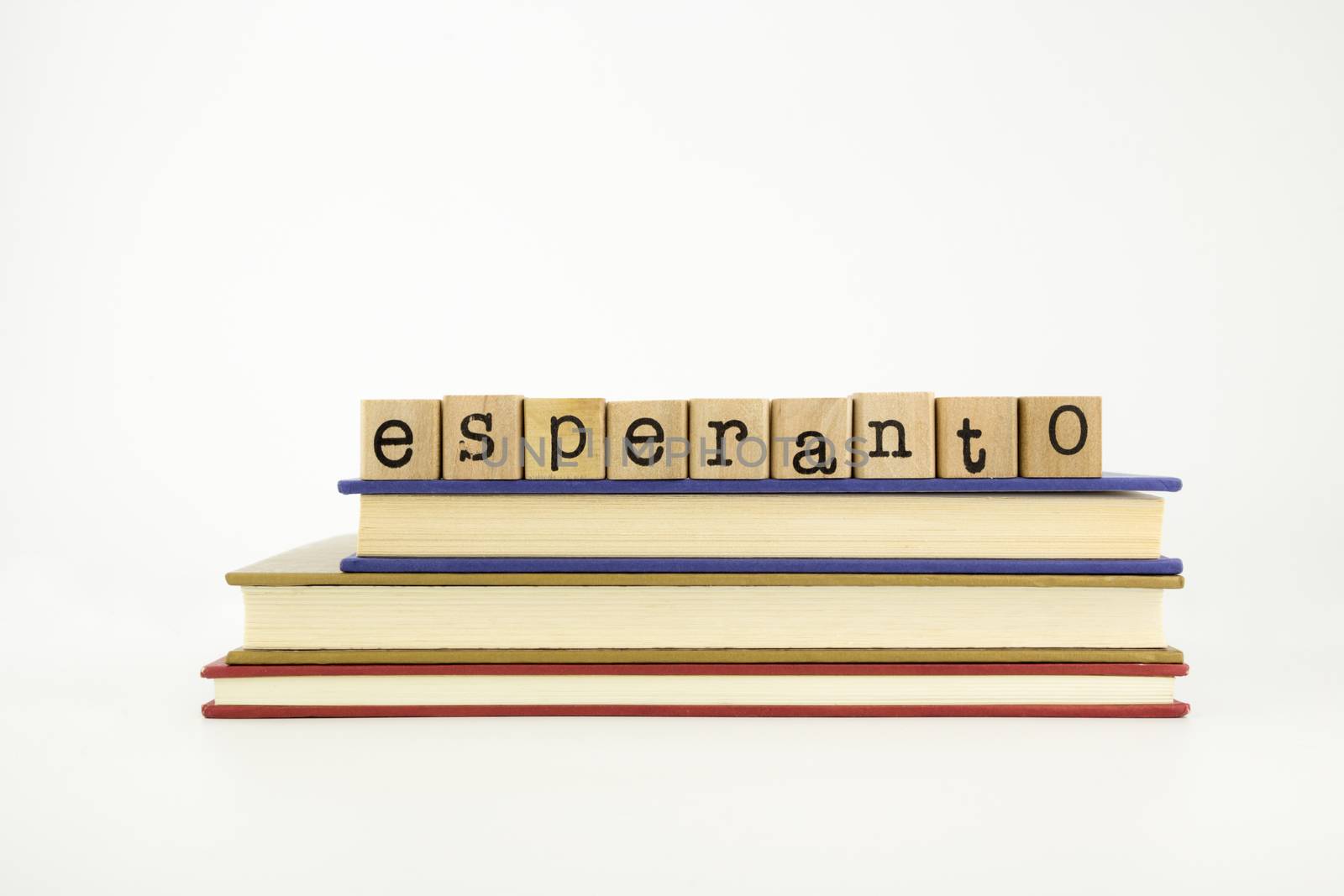 esperanto language word on wood stamps and books by vinnstock
