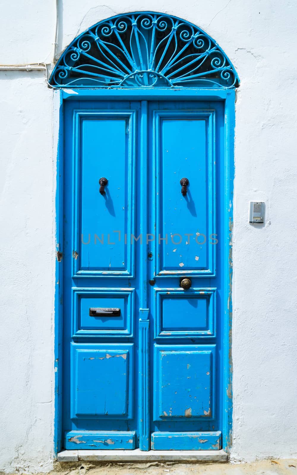 Aged Blue door in Andalusian style from Sidi Bou Said in Tunisia. Large resolution