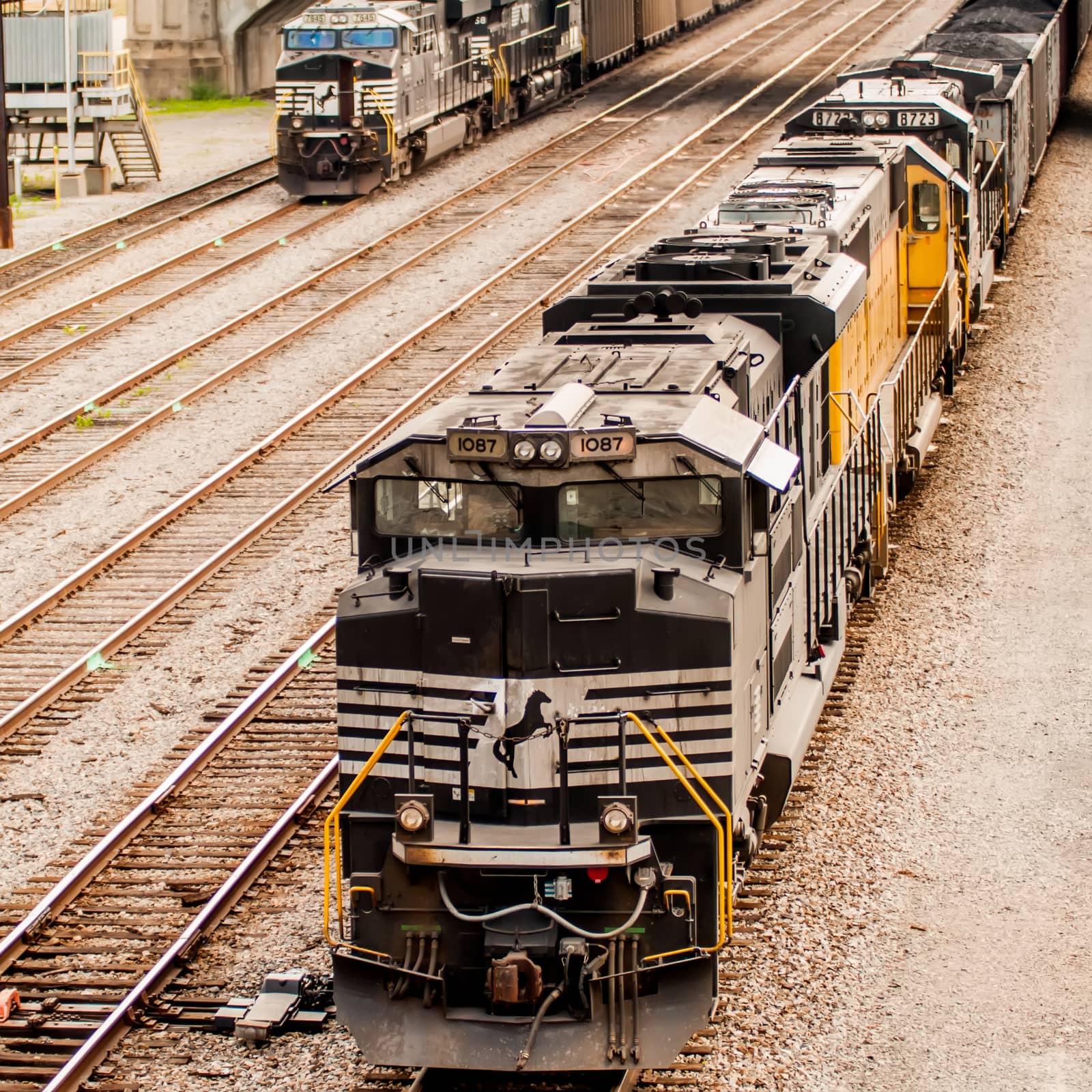 slow moving Coal wagons on railway tracks