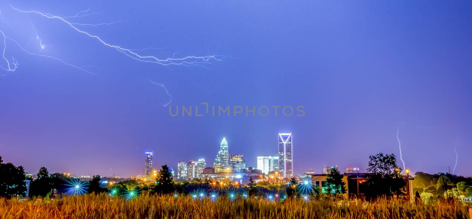 lightning thunder bolts over charlotte skyline by digidreamgrafix