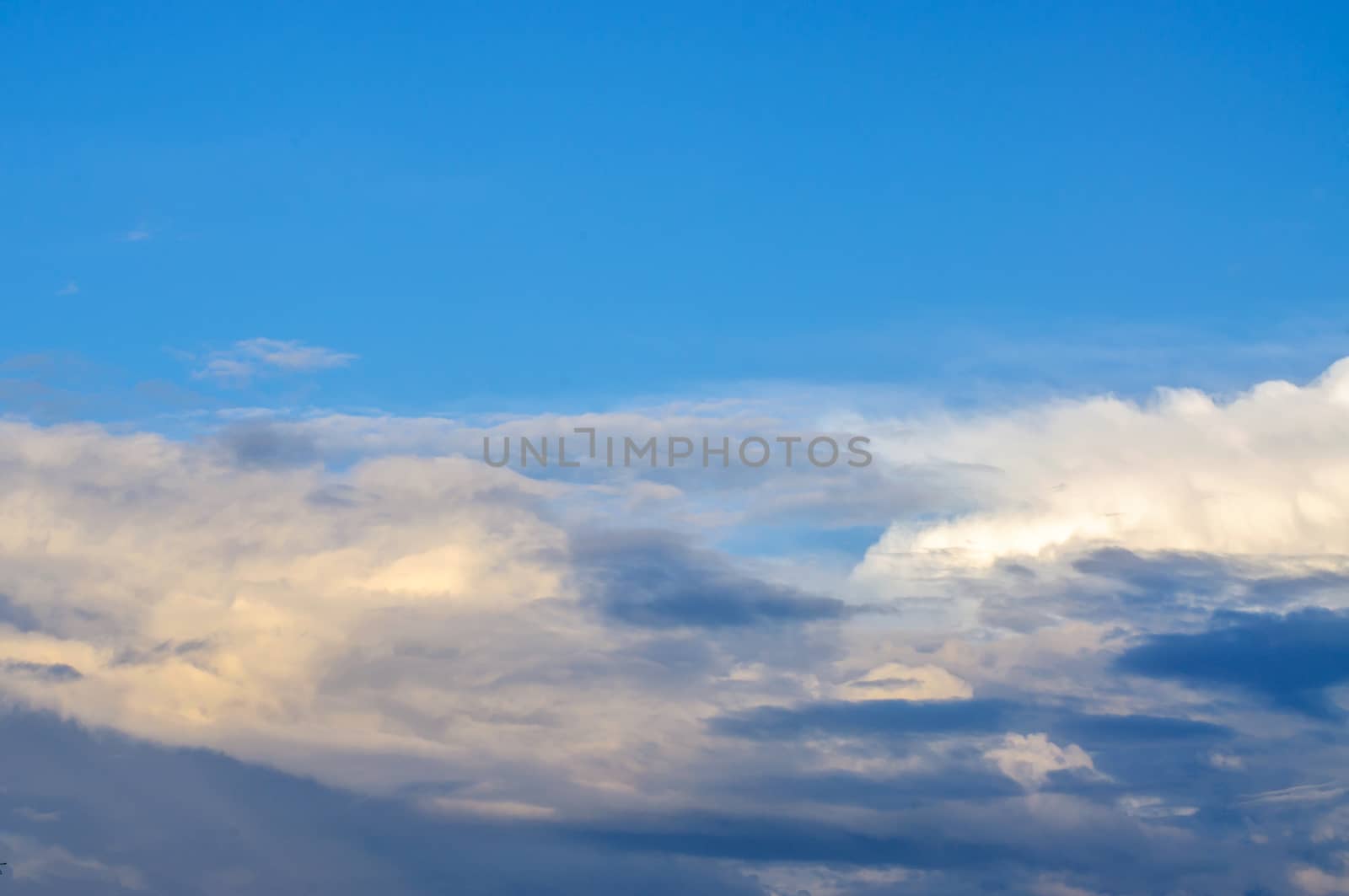 Blue sky background by NuwatPhoto