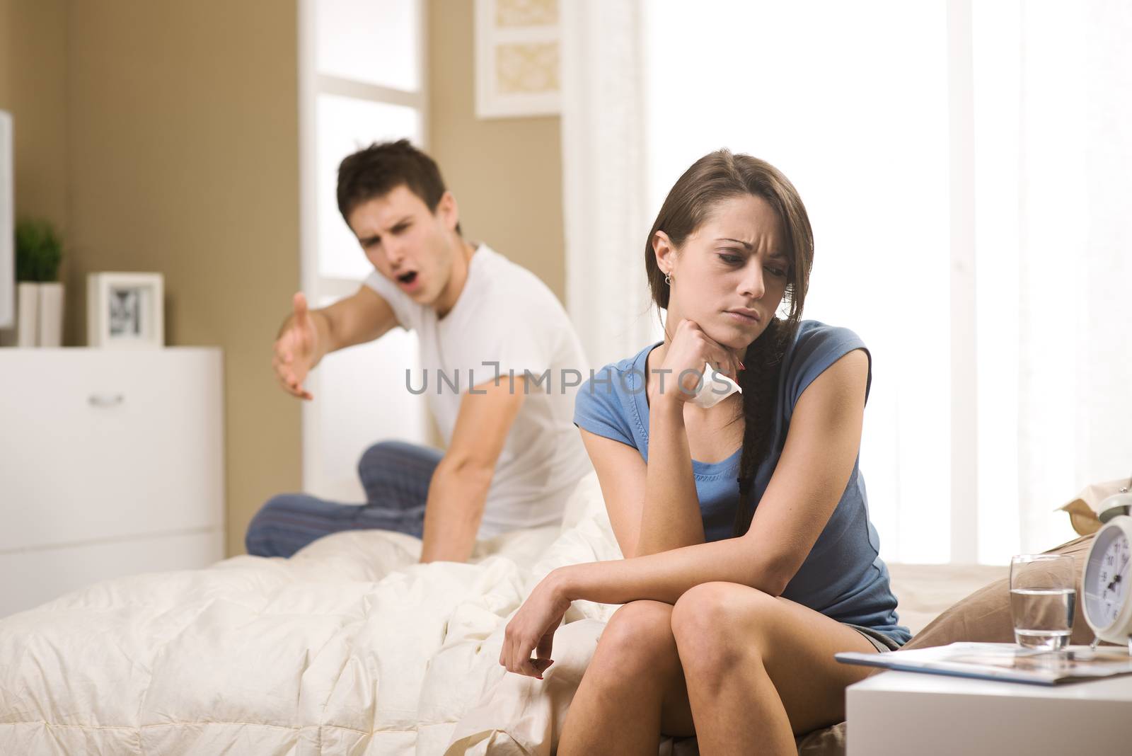 Man screaming on woman, couple having conflict 