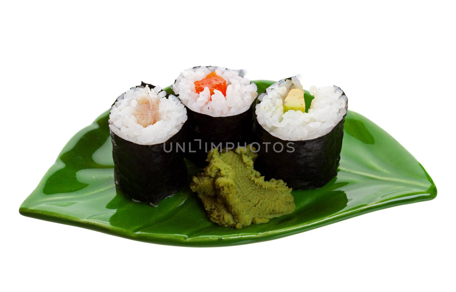 Three kinds of sushi on a leaf shaped plate.  Shot on white background.