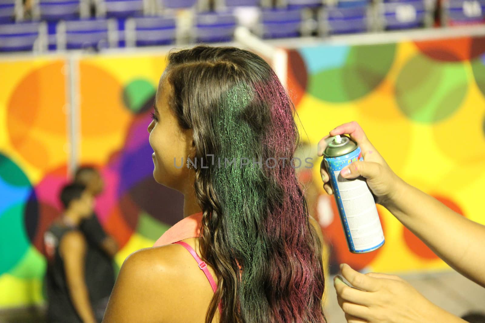 Entertainers getting their hair sprayed with glitter in preparation for entertaining at a carnaval in Rio de Janeiro, Brazil
02 Mar 2014
No model release
Editorial only