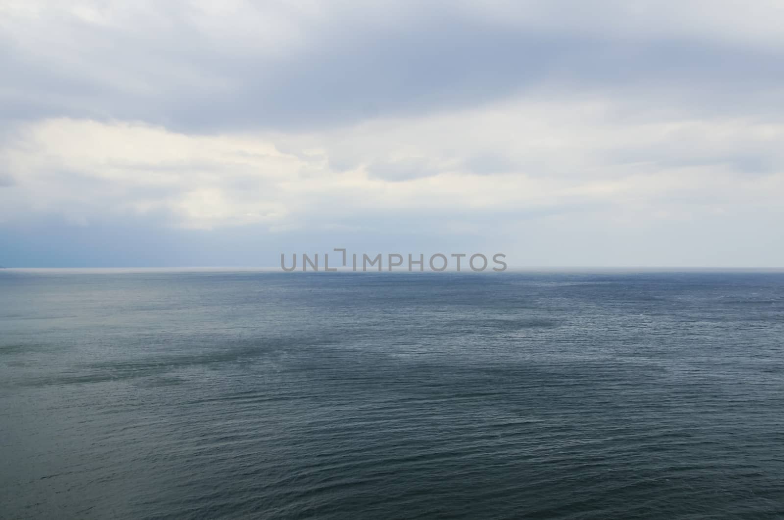 Photo of the Wavy Sea Clear Horizon
