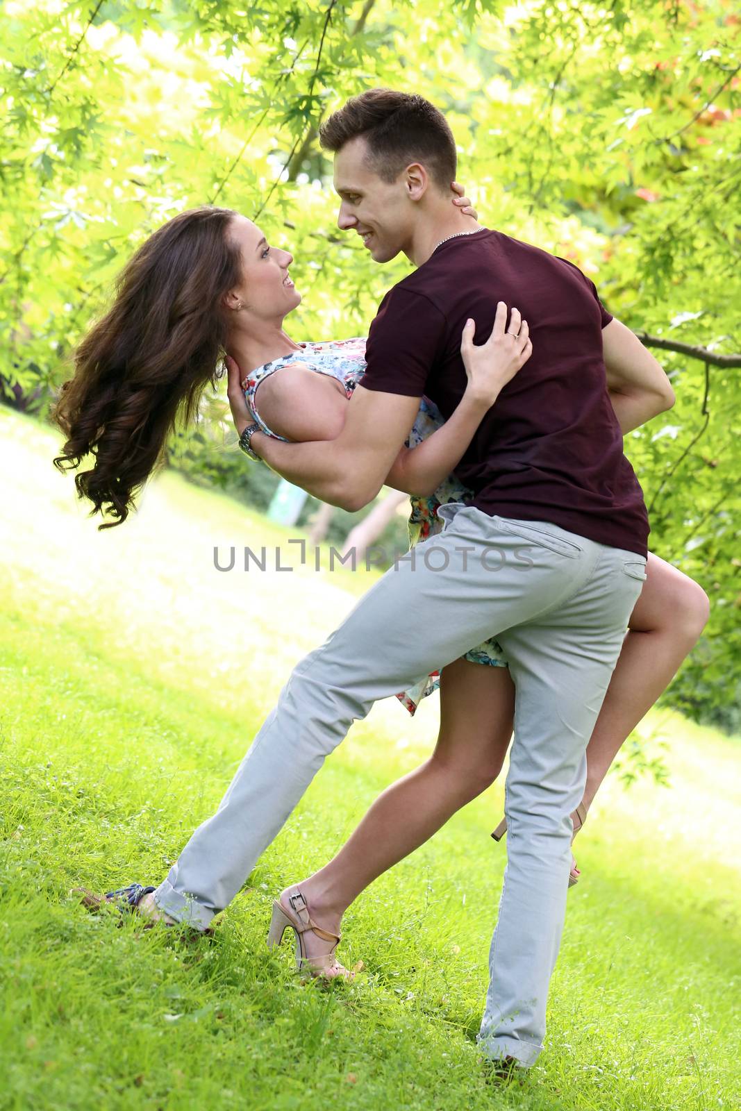 Cute, young couple in the park