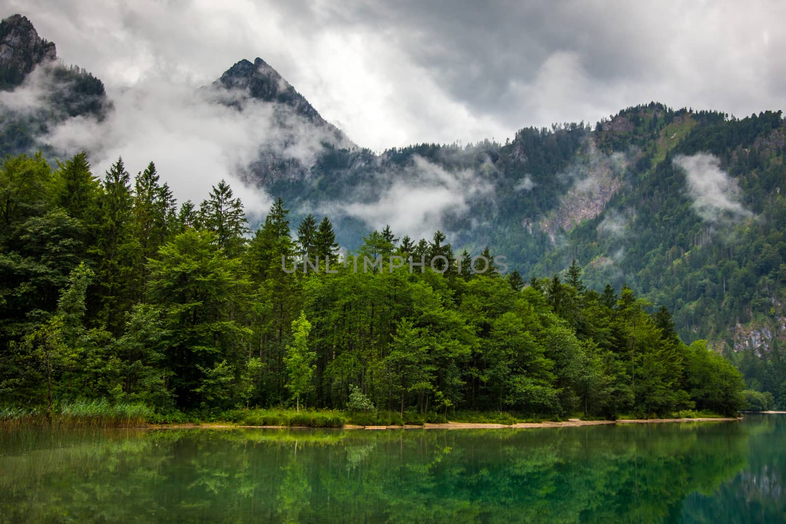 Mountain and lake in high Alps Austria