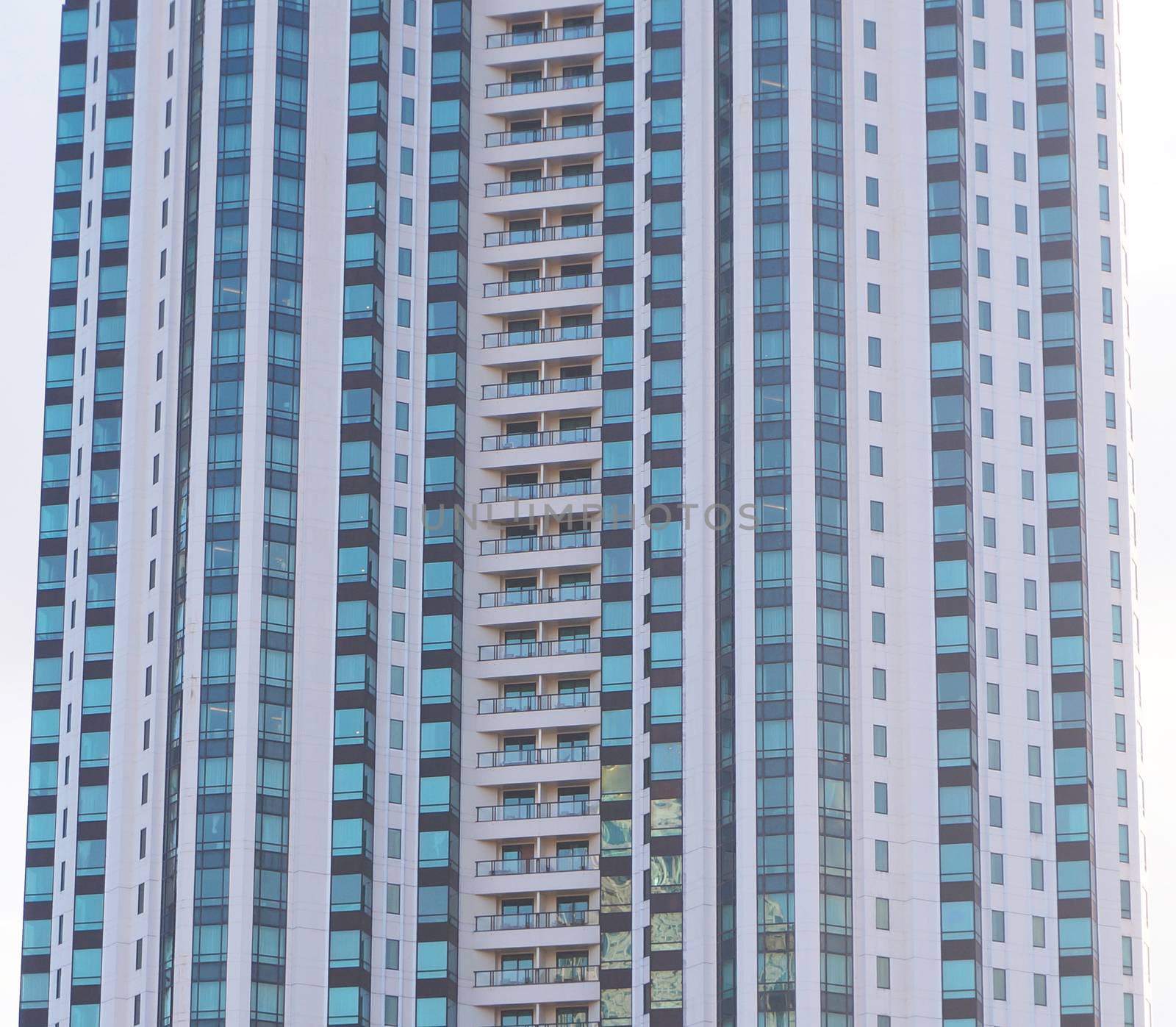 Modern building constructed with concrete.
The windows made from glass, overlooking the outside.                               