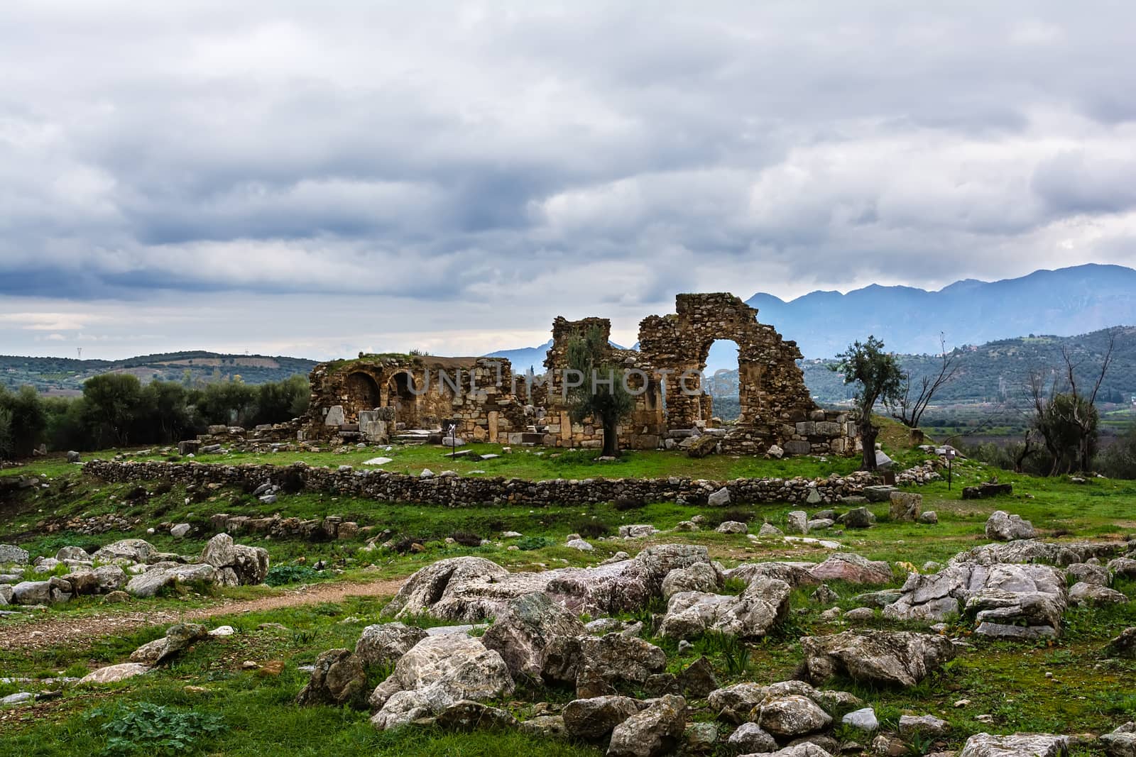 Ancient Troizina Ruins with dramatic sky, Greece by ankarb