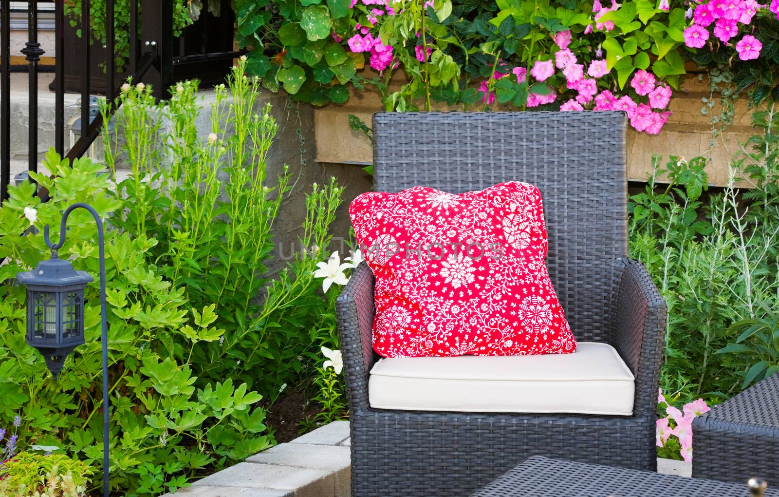 A peaceful resting spot in a beautiful garden retreat.  The perfect place to curl up and read.