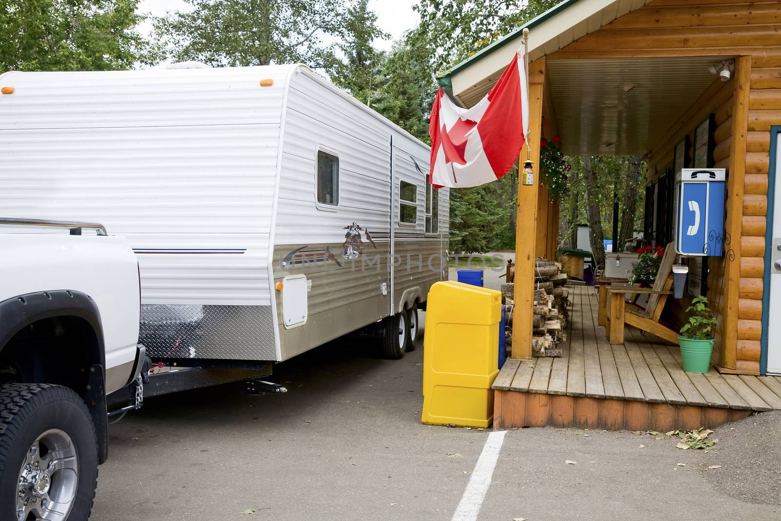 Truck & RV checking into a Canadian campground office.