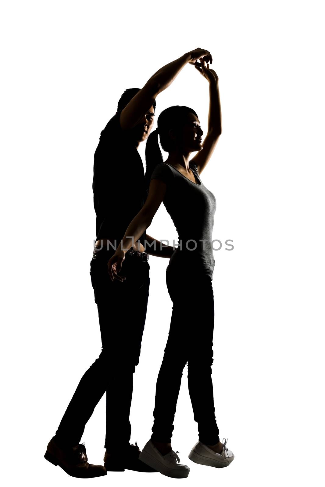 Silhouette of Asian couple dancing by elwynn