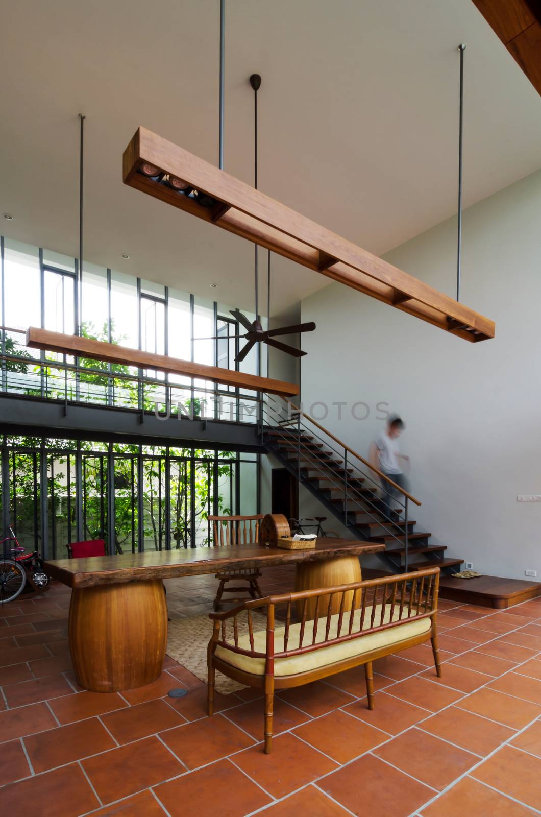 Stylish house interior with staircase by siraanamwong