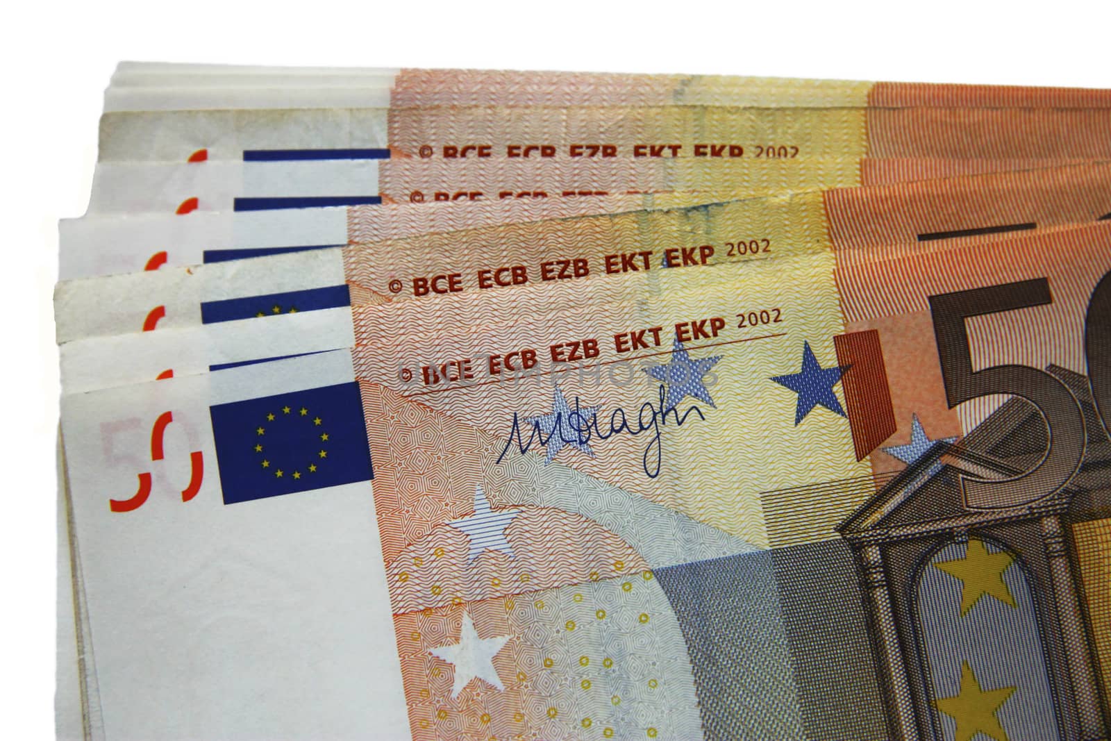 Stack of fifty euro banknotes isolated on the white background