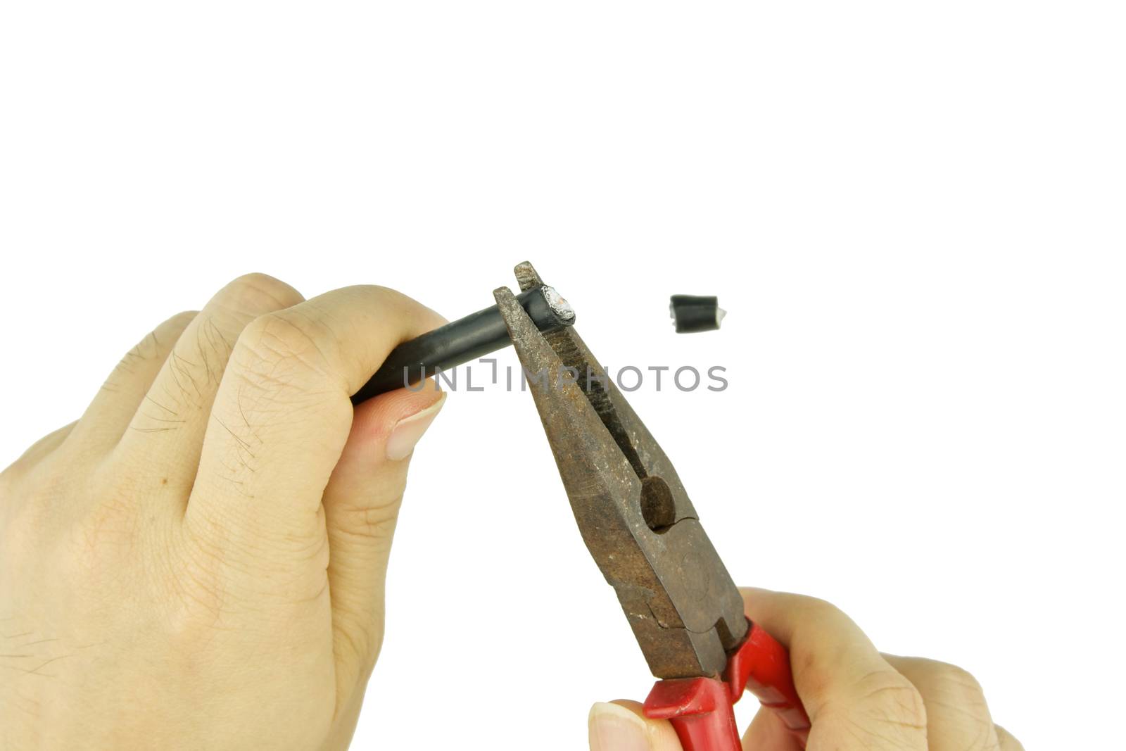 Man use pliers to pinch cable line for repair isolated with white background.