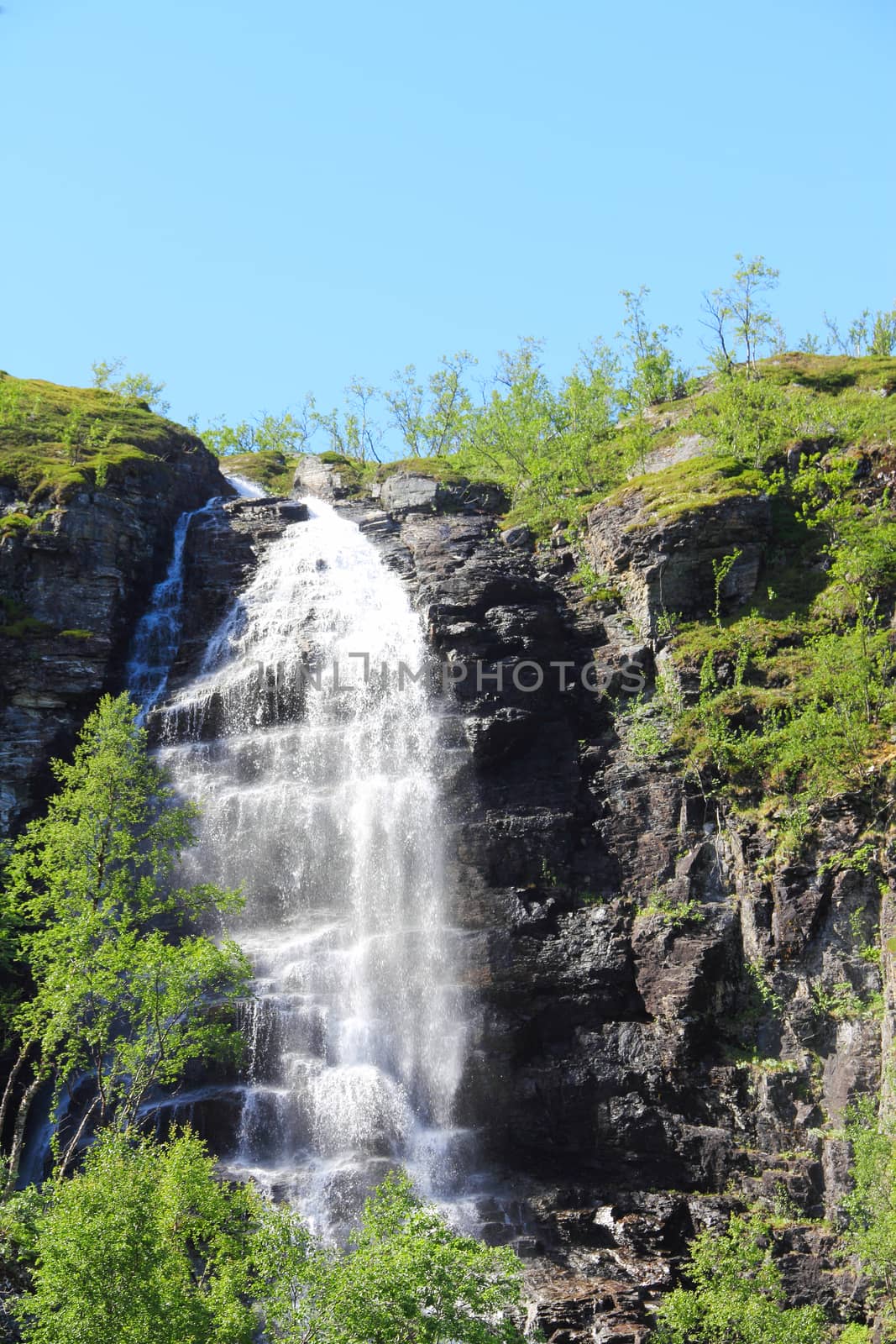 View on waterfall in Norway at sunny day