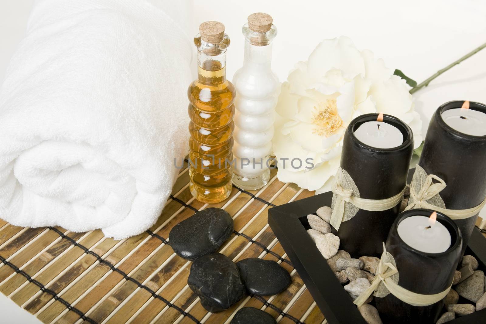 Bath & spa products with massage stones, oil essences & aromatic candles.