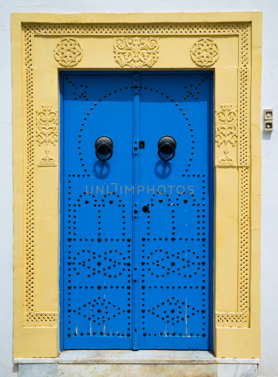 Blue door with ornament from Sidi Bou Said in Tunisia. Large resolution