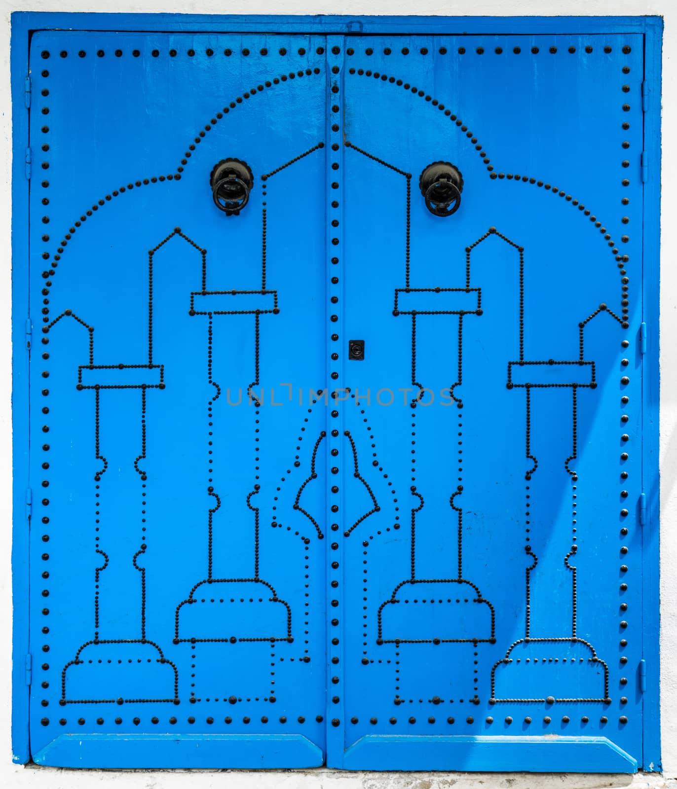 Blue door with traditional ornament as symbol of Sidi Bou Said in Tunisia. Large resolution