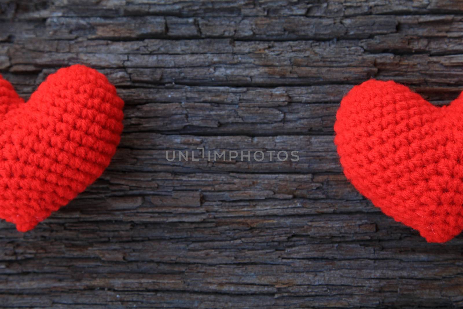 Love hearts on wooden background