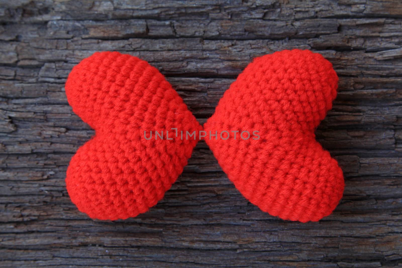 Love hearts on wooden background