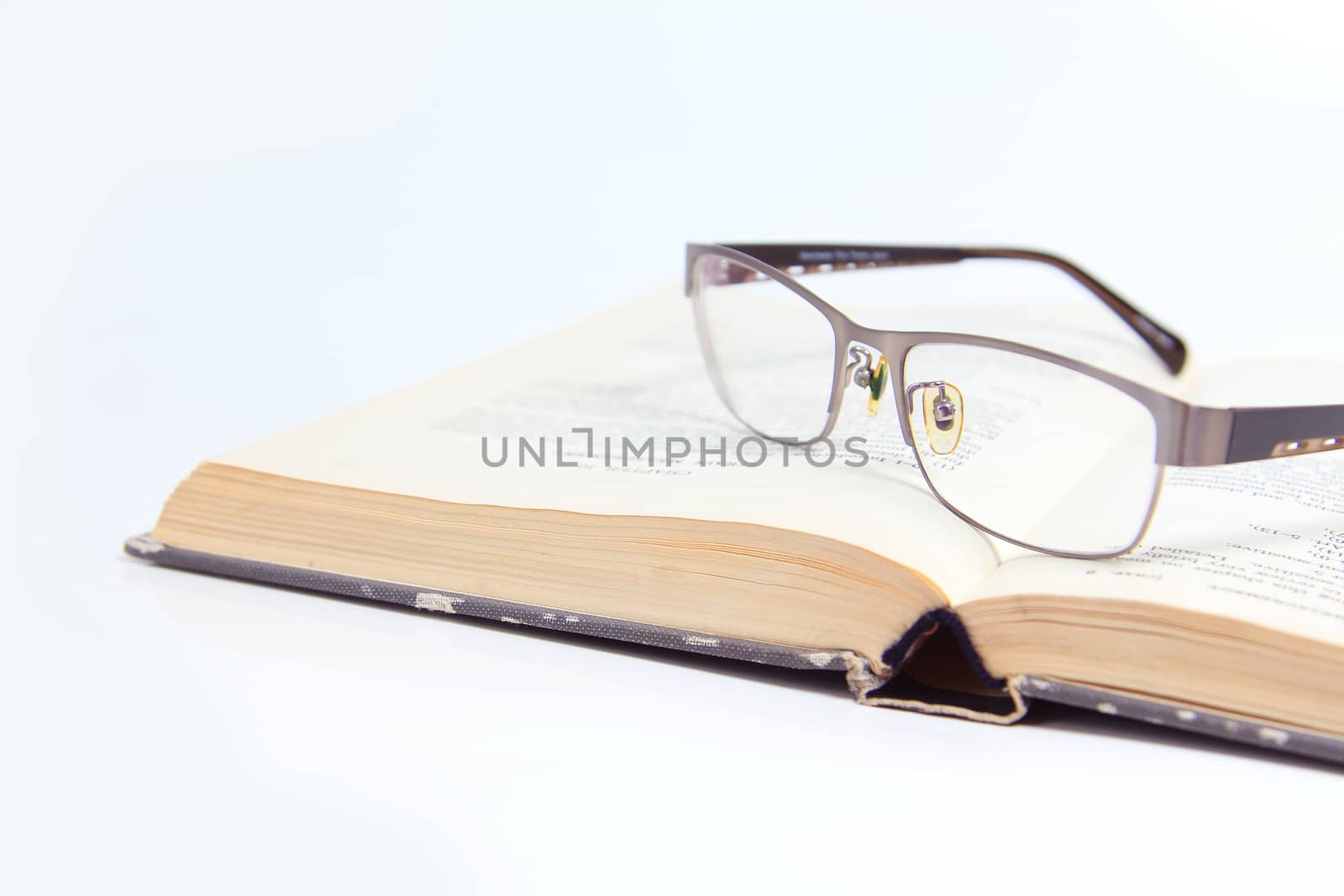 Glasses and book