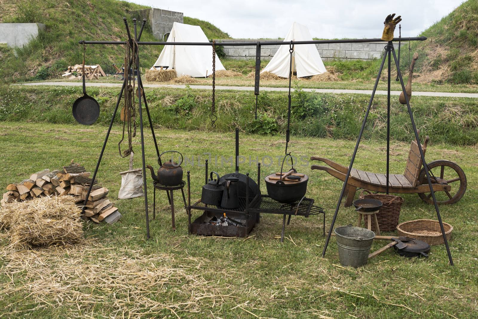 old coocking equipment with tent outside on  camping