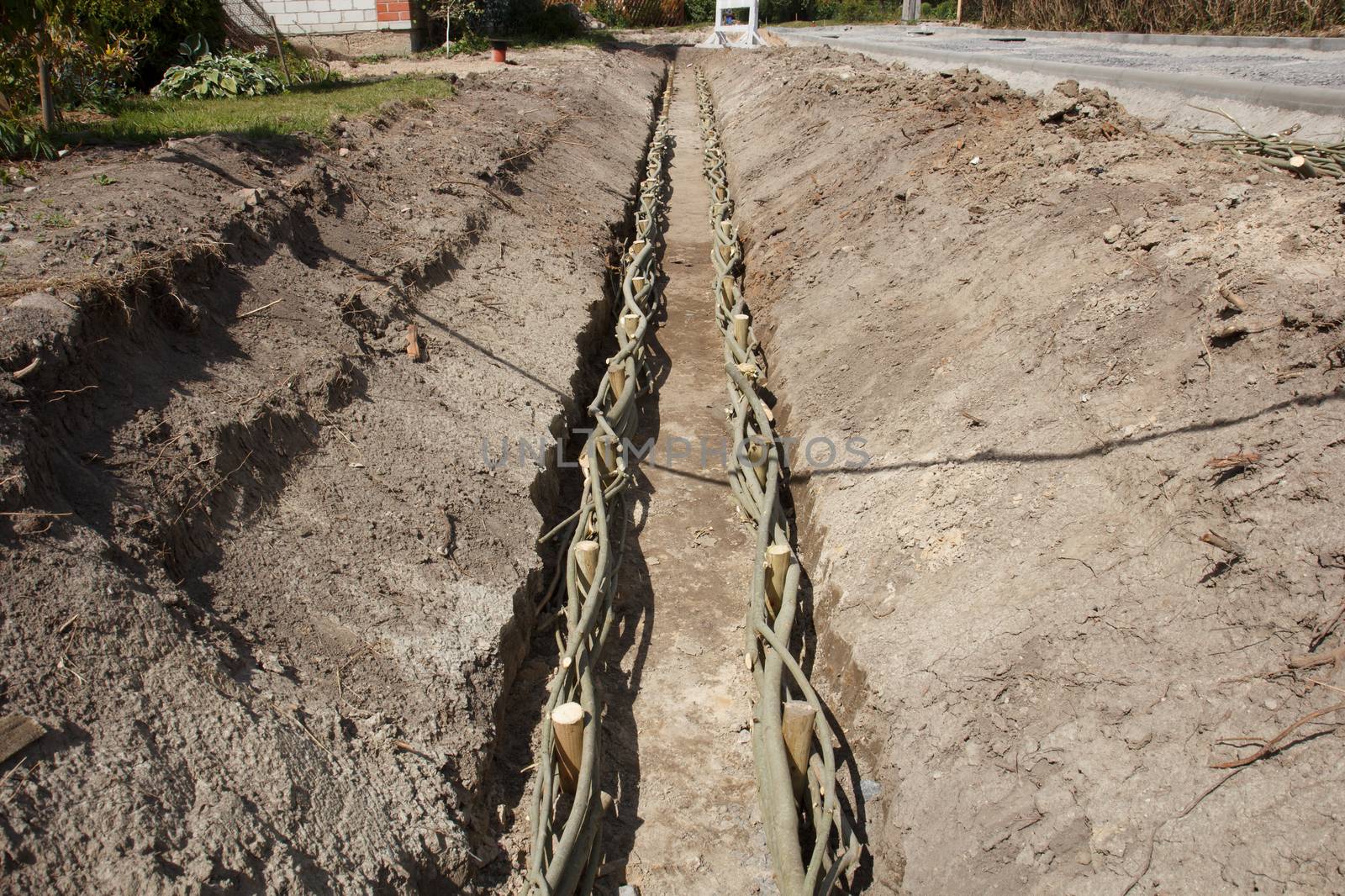 a unfinished waste water trench construction site