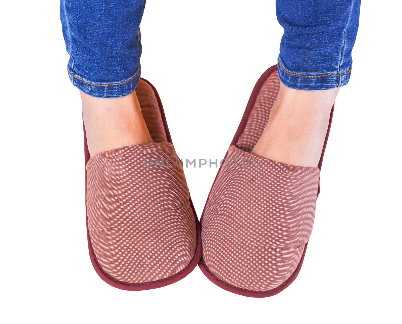 hotel slipper and foot on white background