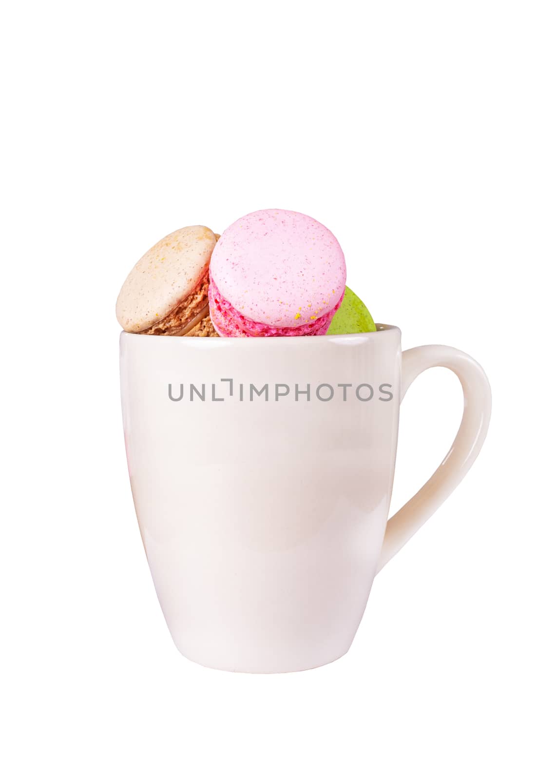 traditional french colorful sweet Macaron in cup on white background