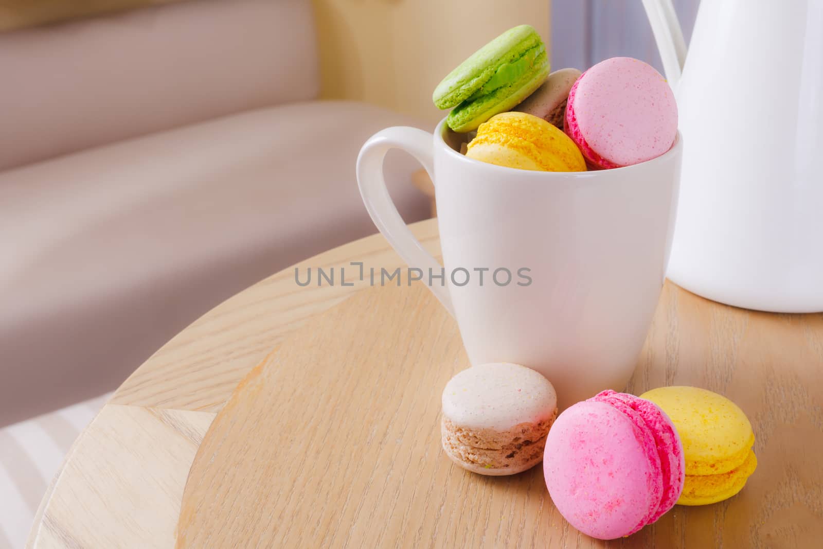 traditional french colorful sweet Macaron in cup