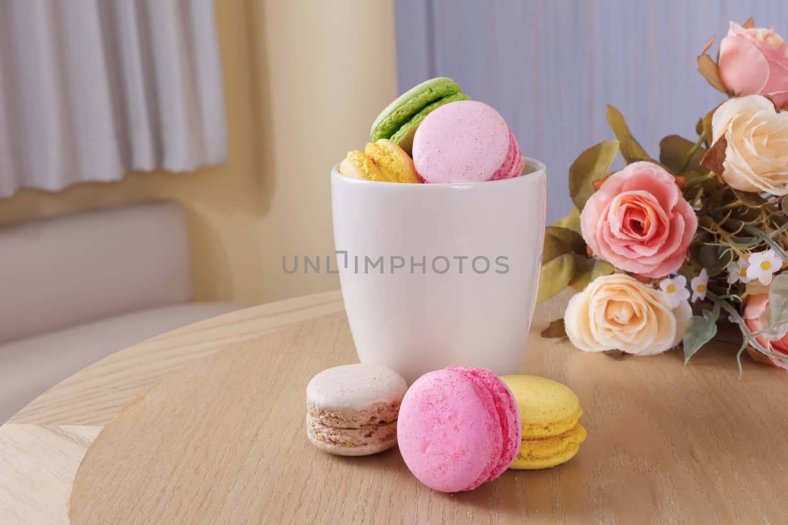 traditional french colorful sweet Macaron in cup