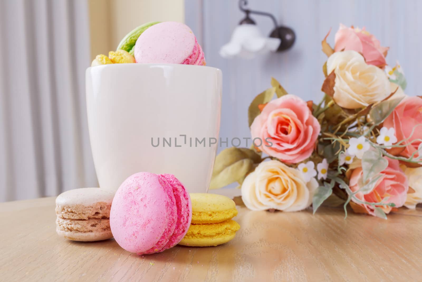 traditional french colorful sweet Macaron in cup