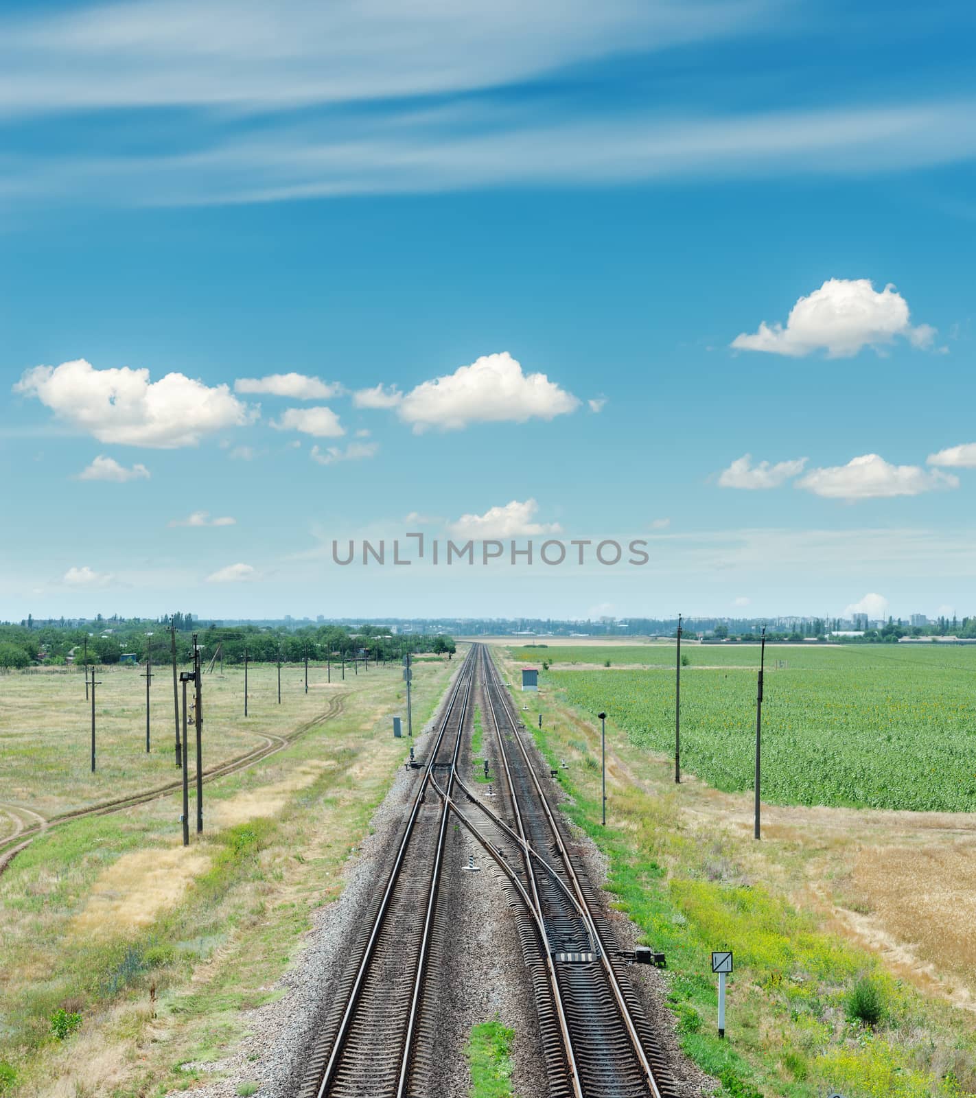 two railroad to horizon and blue sky by mycola
