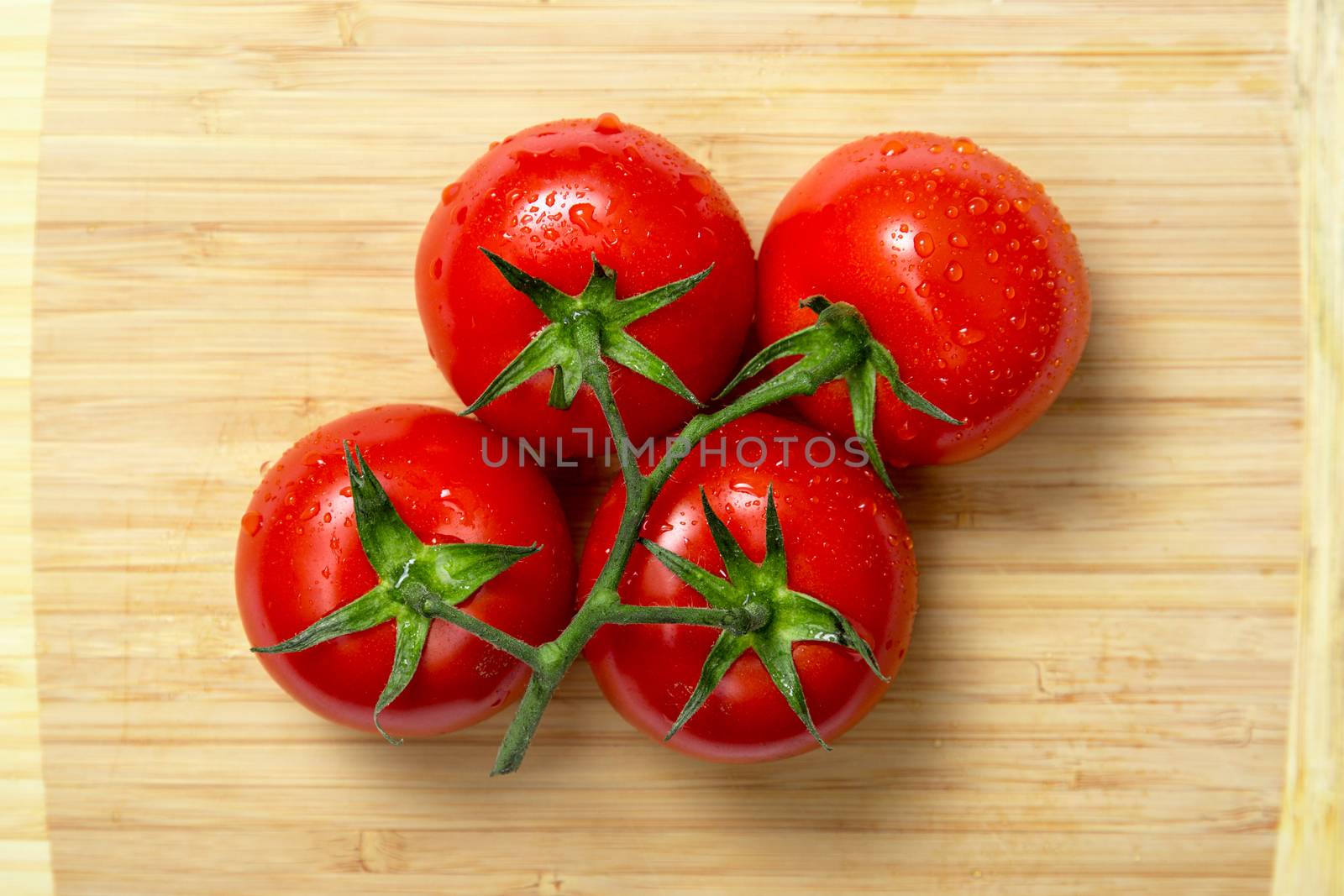 Top view of fresh tomatoes  by Elisanth