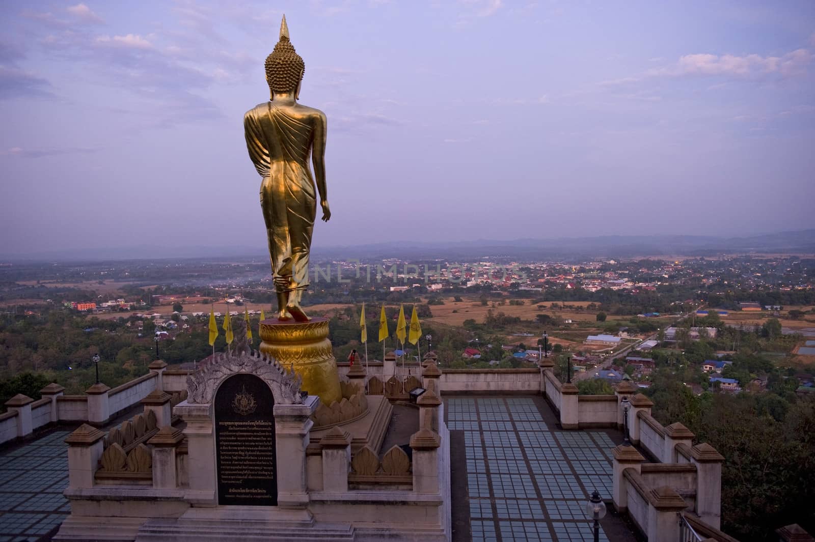 Buddha standing on a mountain Wat Phra That Khao Noi, Nan Province, Thailand