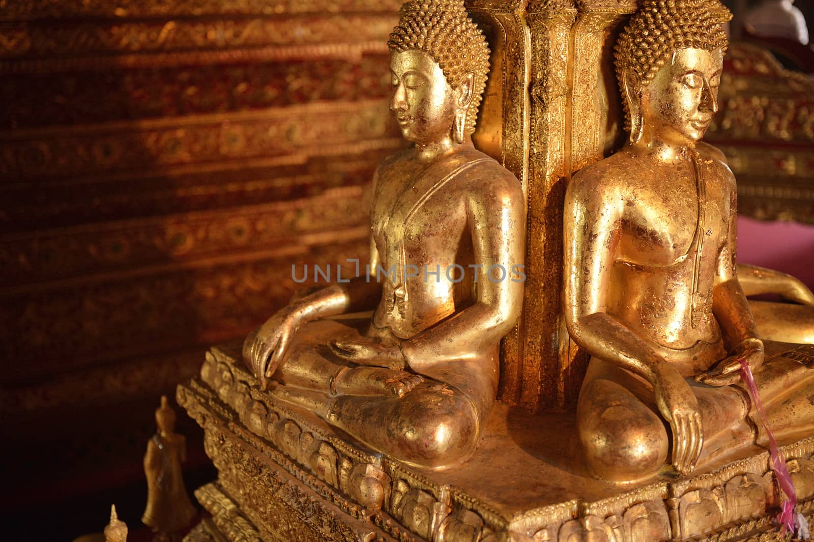 There are four small statues of Buddha in the temple Phumin Nan, Thailand