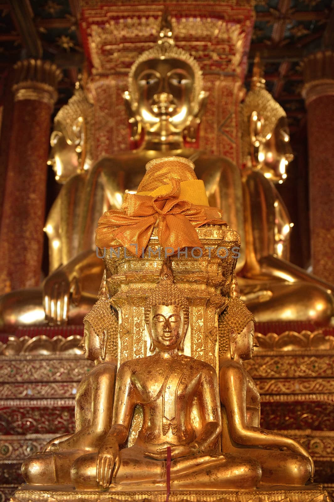 There are four small statues of Buddha in the temple Phumin Nan, Thailand
