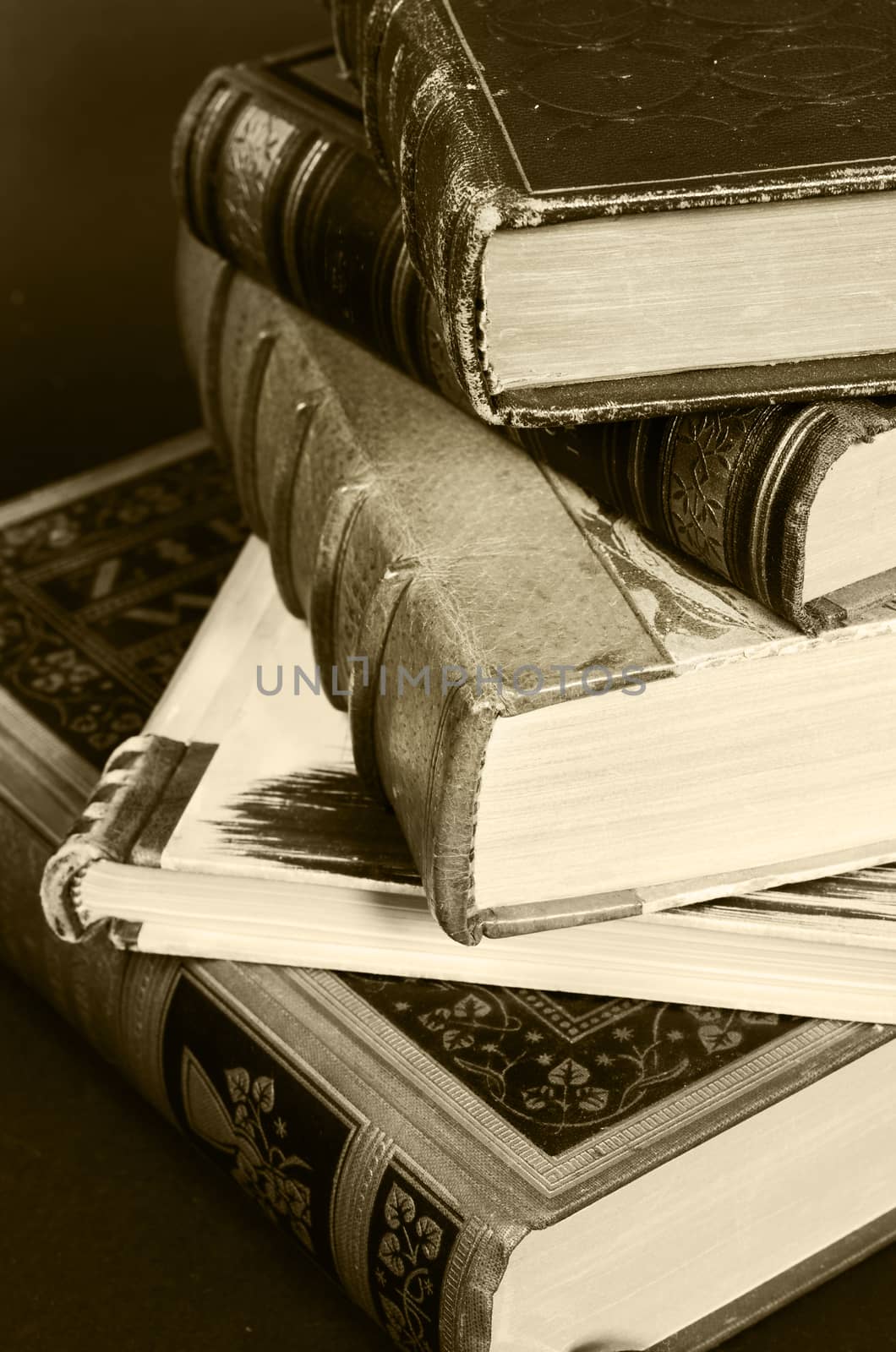 stack of antique books