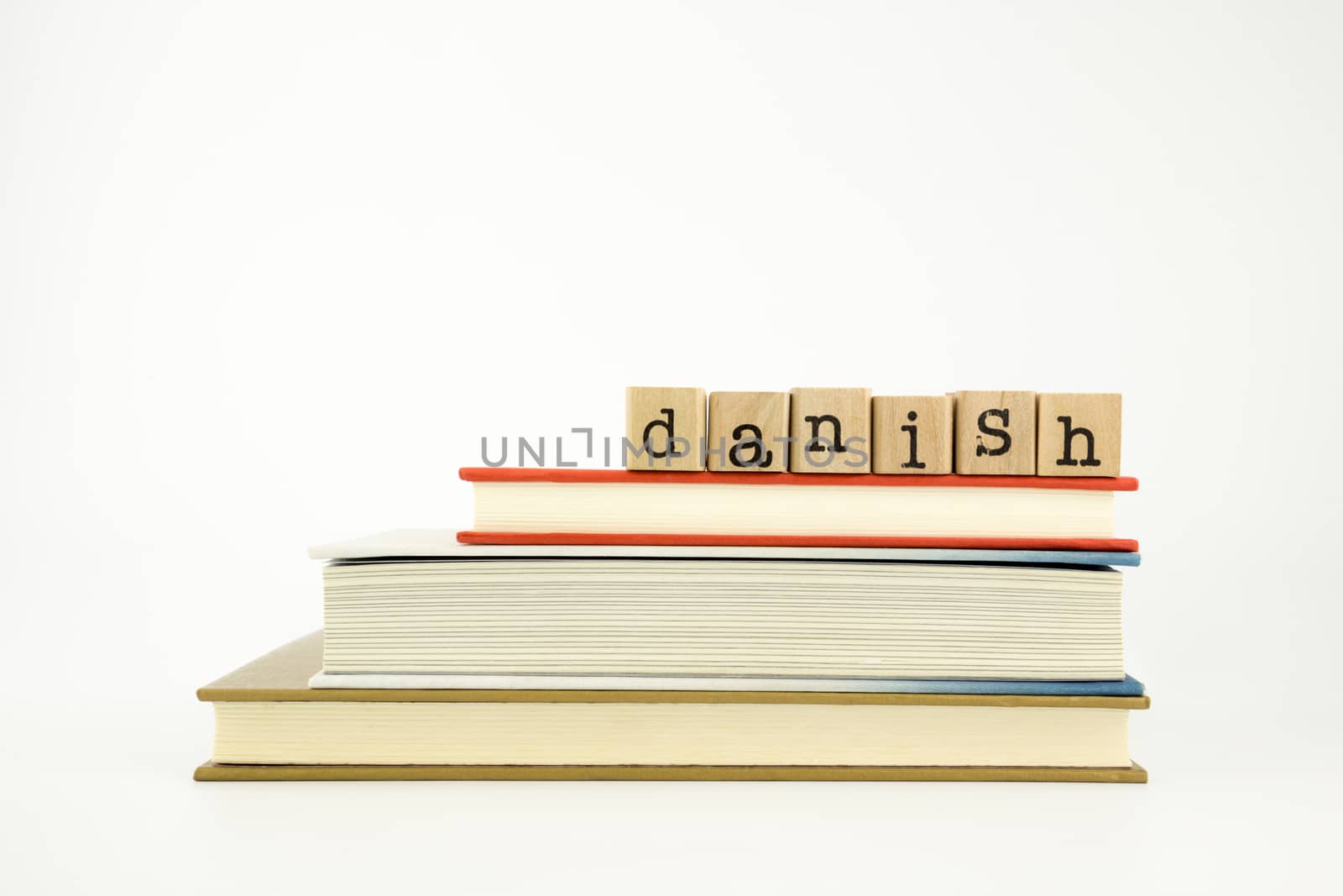 danish language word on wood stamps and books by vinnstock
