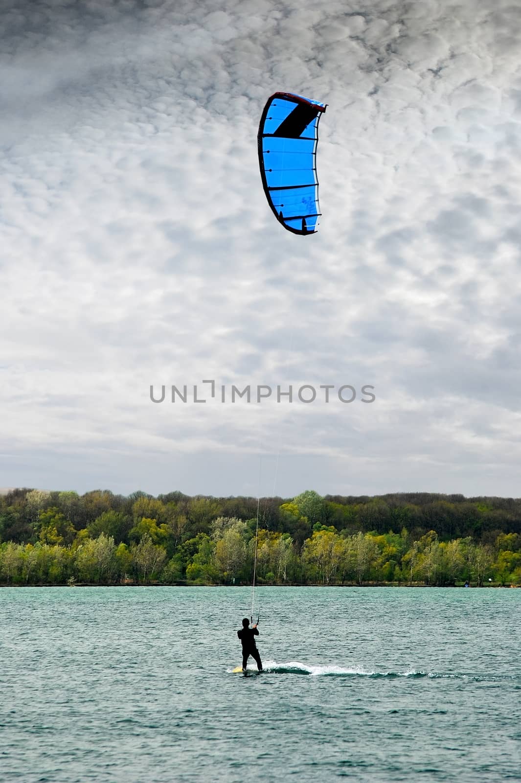 kite adrenaline ride on the lake, speeding