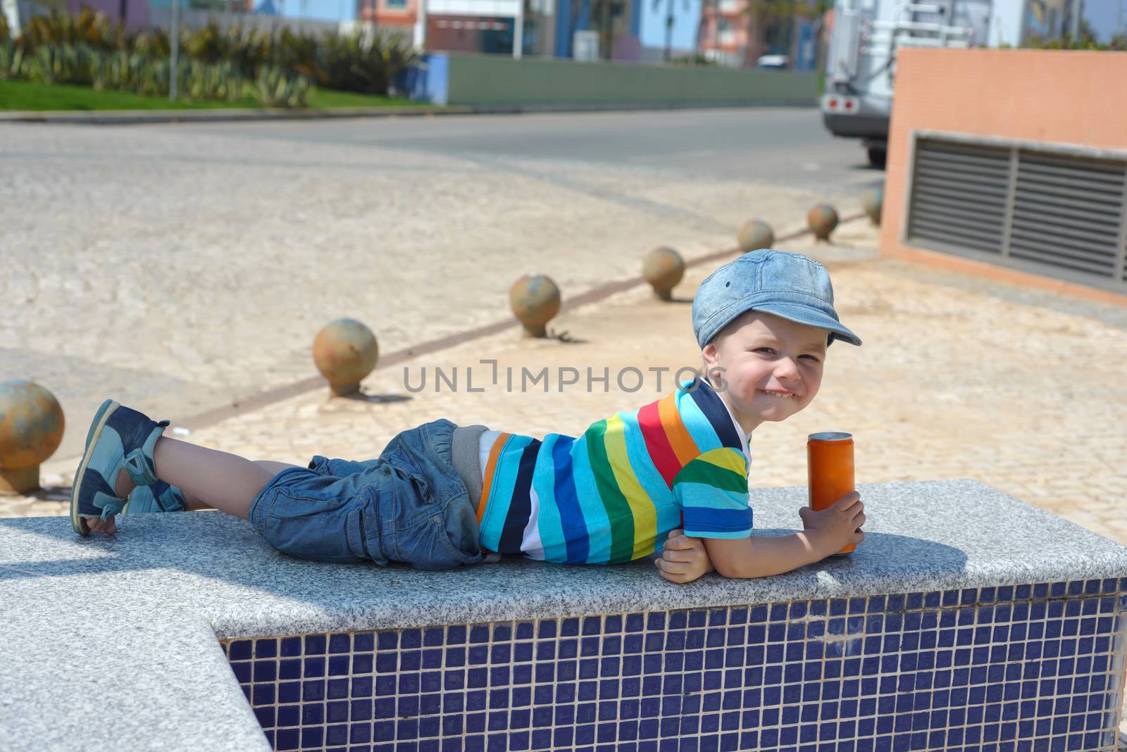 Cute happy little boy with drink by anytka