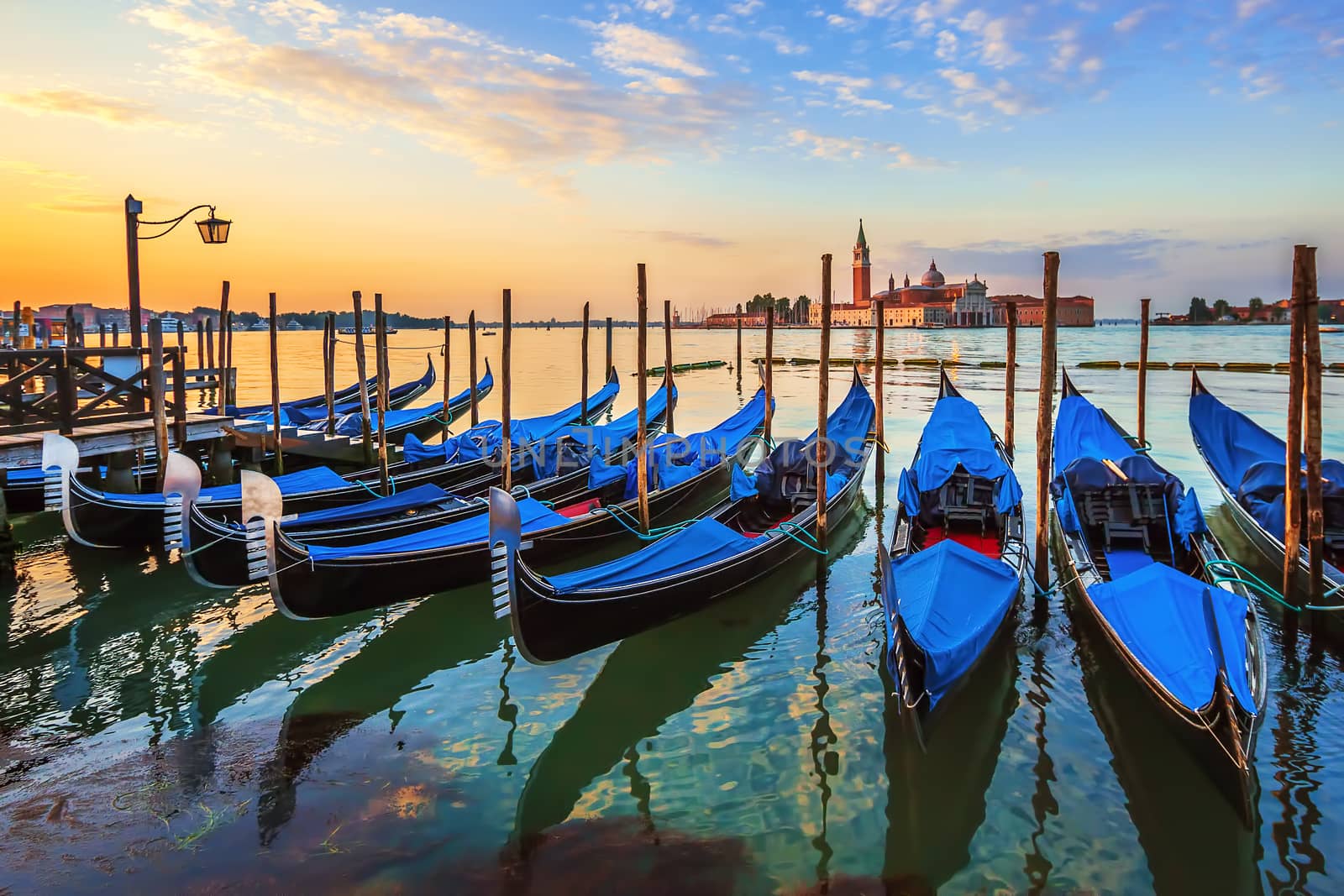 Venice with famous gondolas at sunrise, Italy