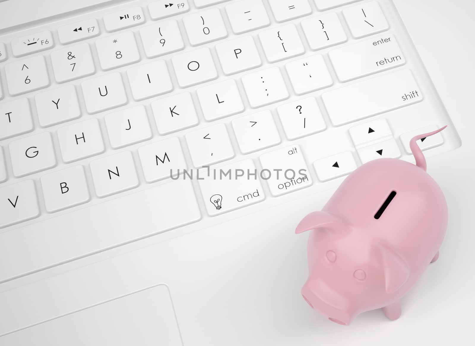 Piggy bank on the keyboard. View from above