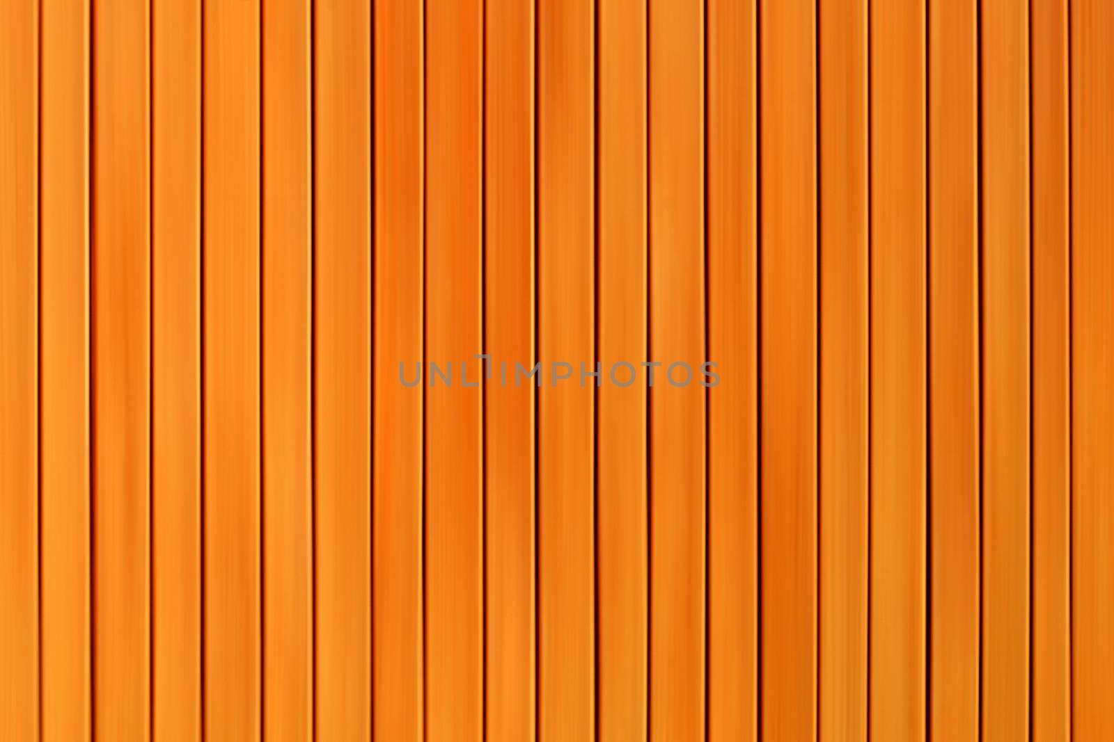 background and texture blurred wooden boards pine color