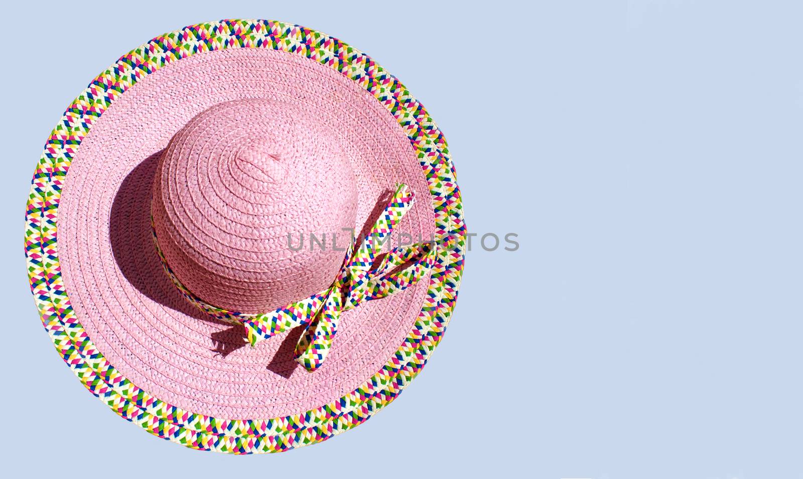 Summer hat isolated on a blue background