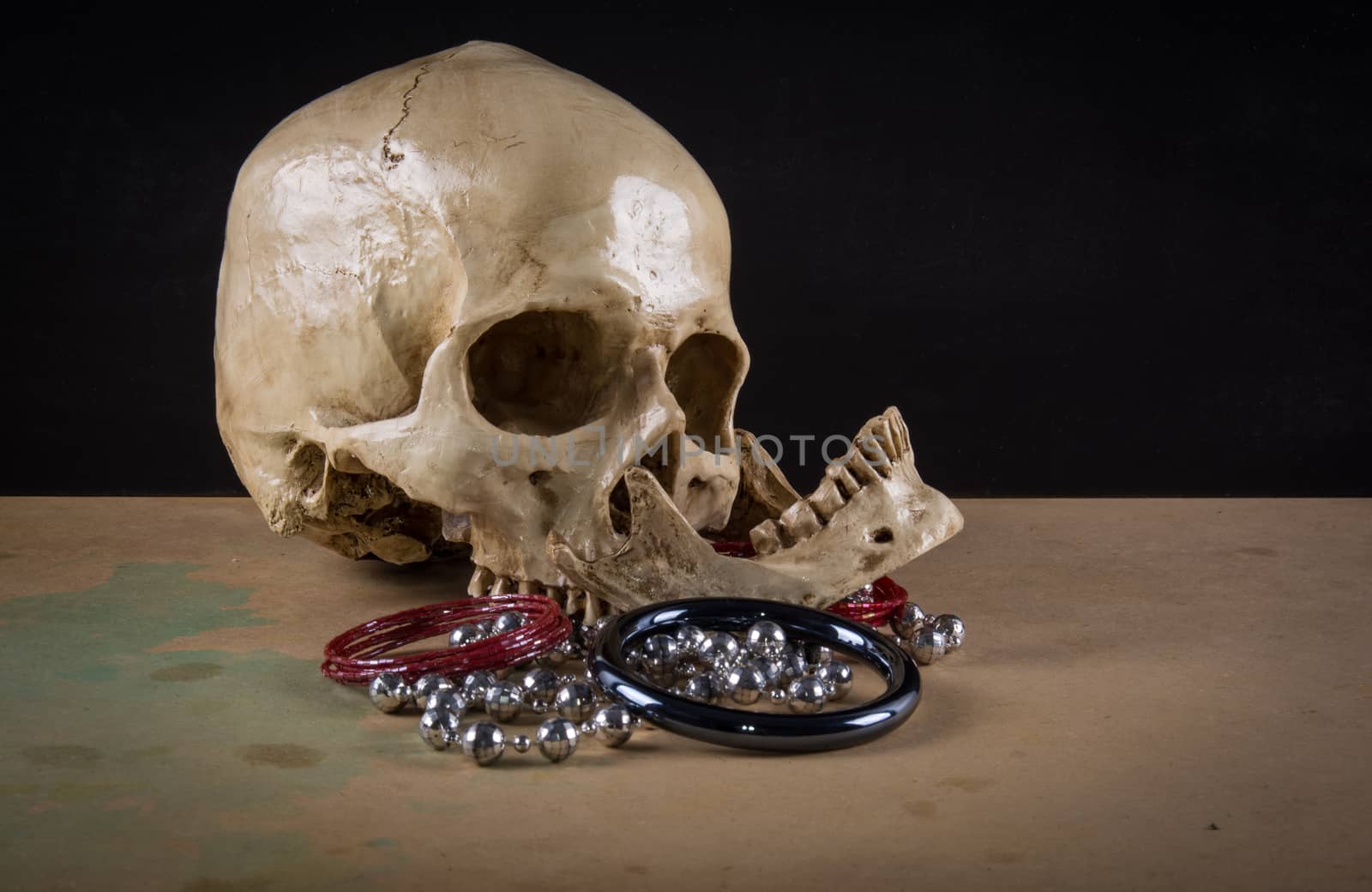 human skull dead but still loves his valuable gorgeous jewellery