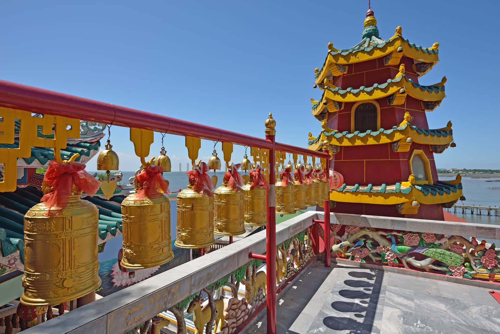 bells in a chinese temple in Choburi province, Thailand. by think4photop