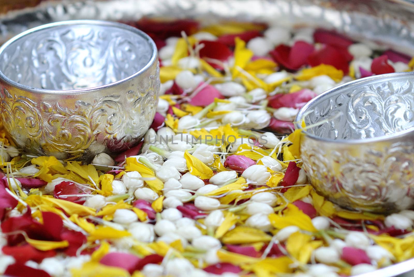 take a bath buddha statue with flower in water, SongKran festival, Thailand by think4photop